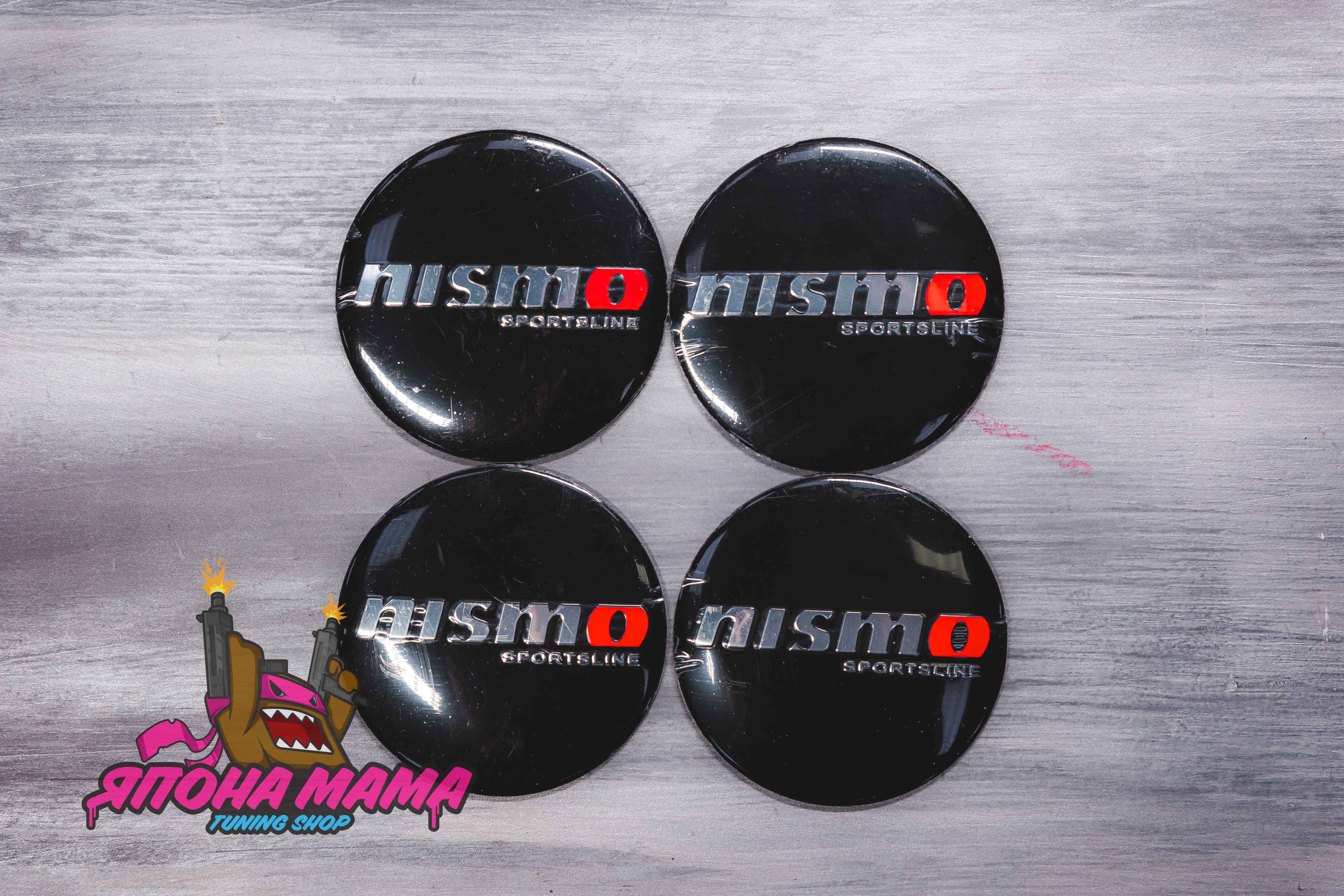 Наклейки на заглушки для литых дисков Nismo