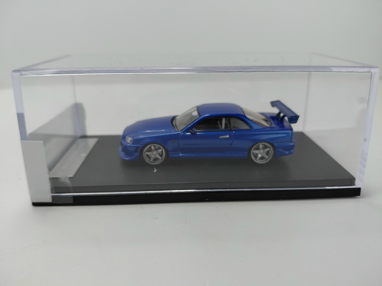 Коллекционная машинка Nissan Skyline GT-R R34 C-West