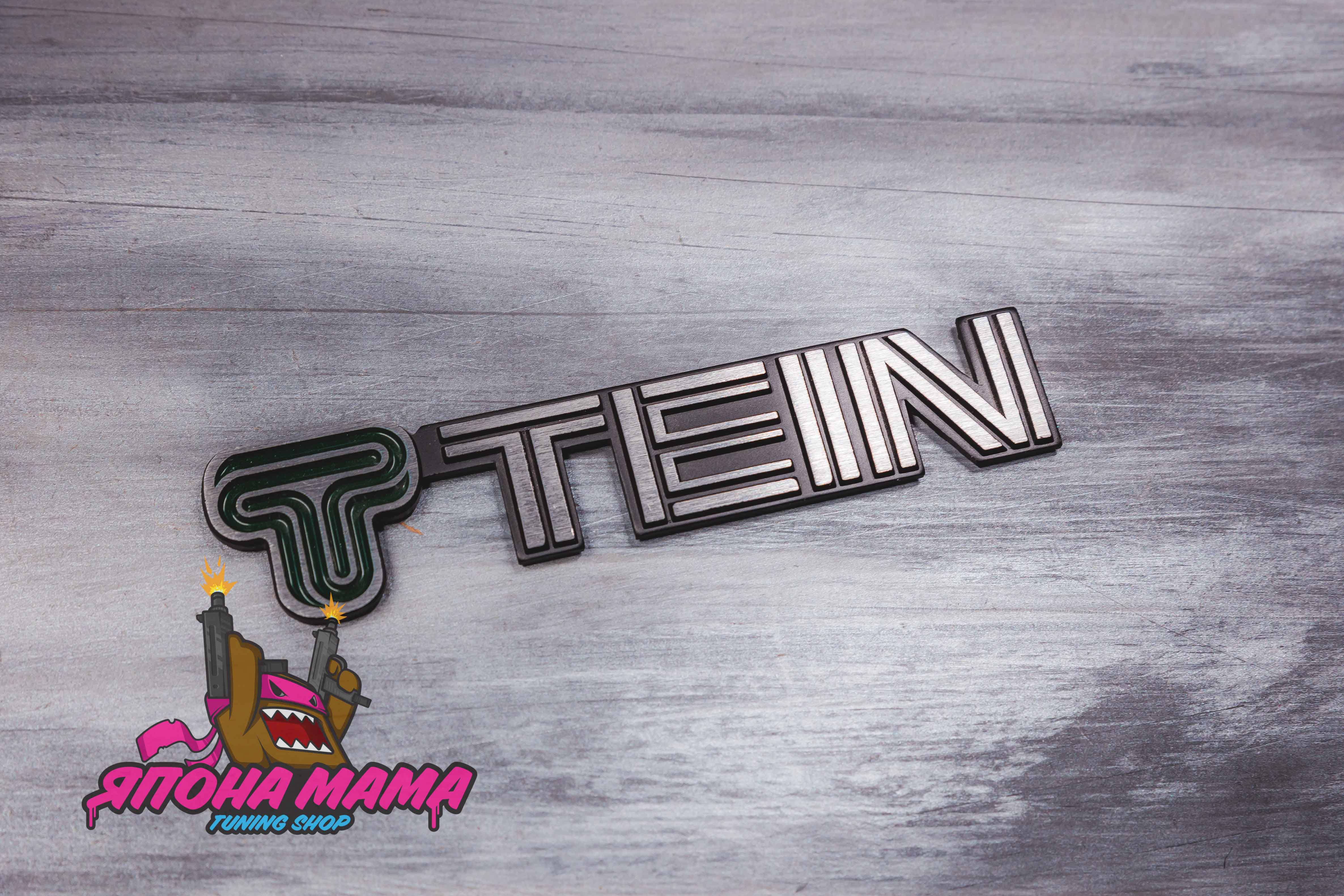 Шильдик TEIN