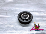 Центральная кнопка спортивного руля Mazda
