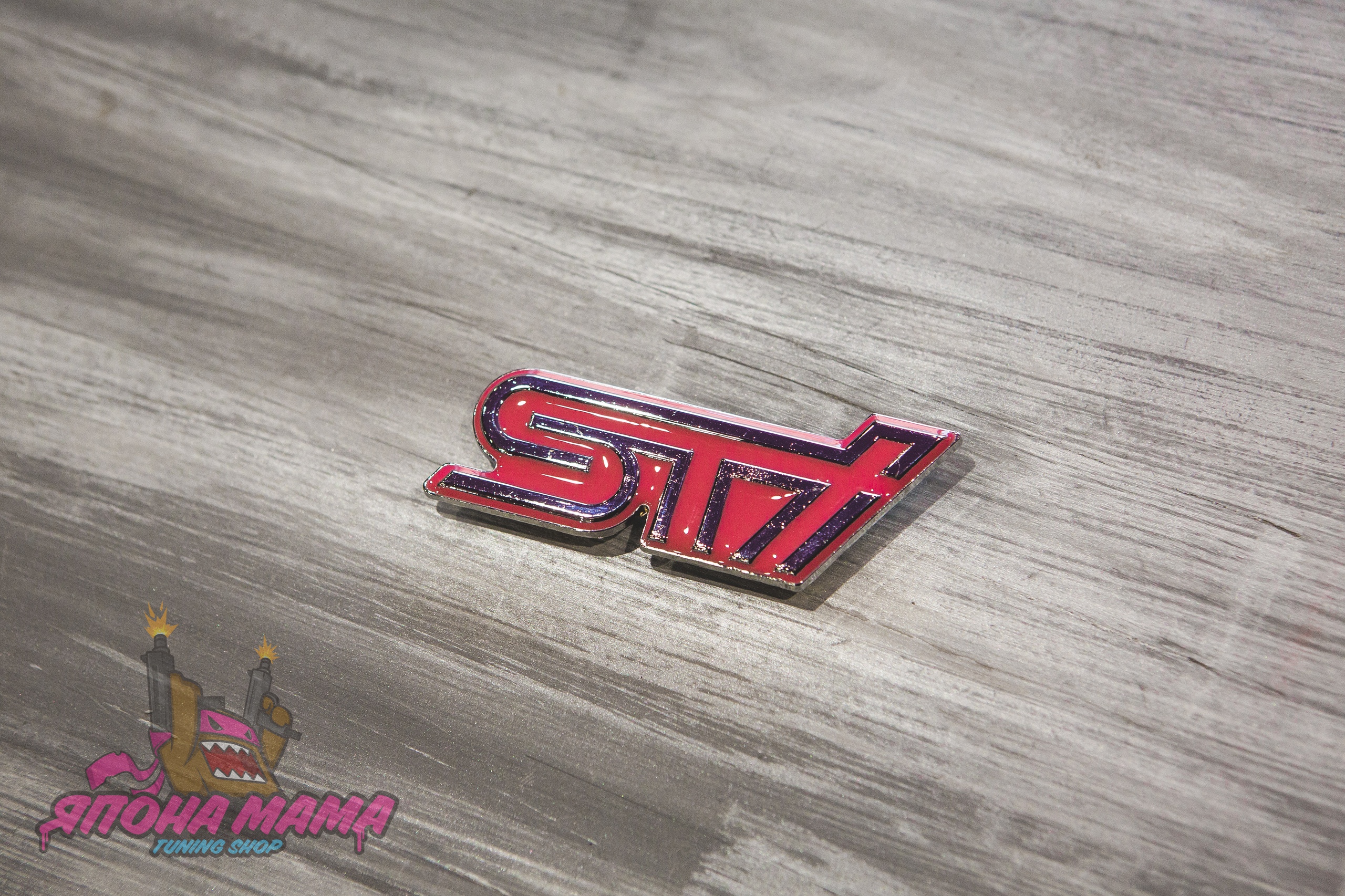 Шильдик STI