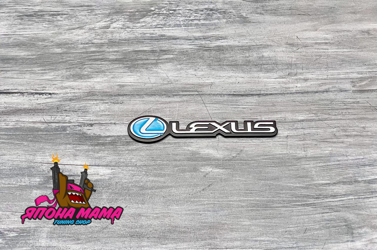 Эмблема Lexus